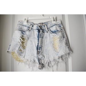 Distressed booty shorts.